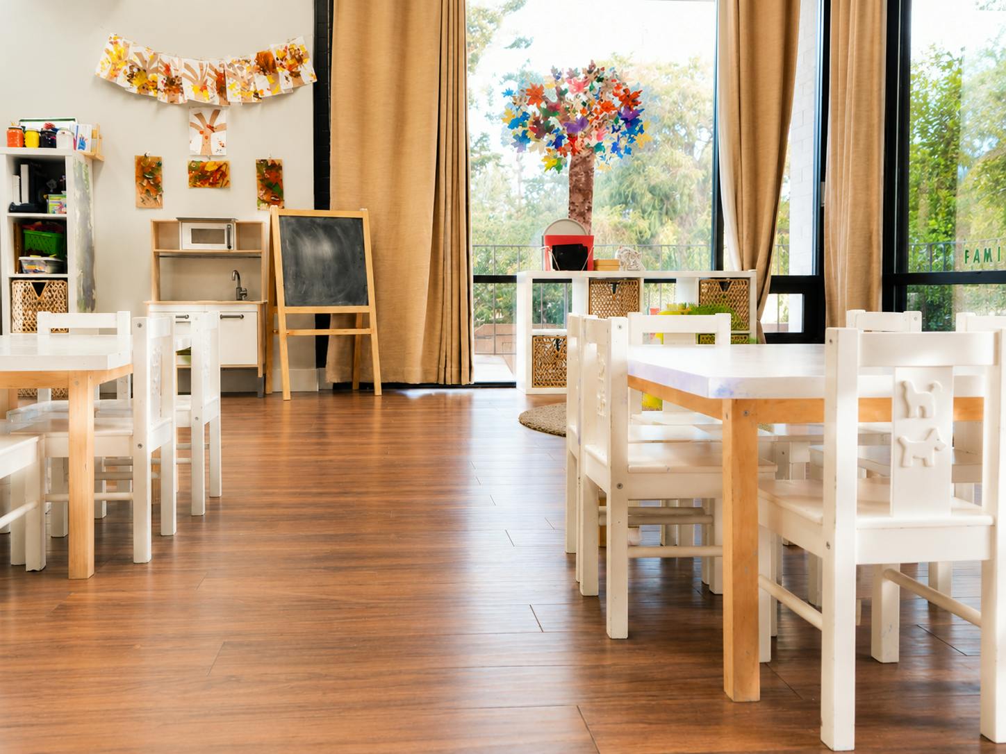 Classroom interior with small tables and chairs for children