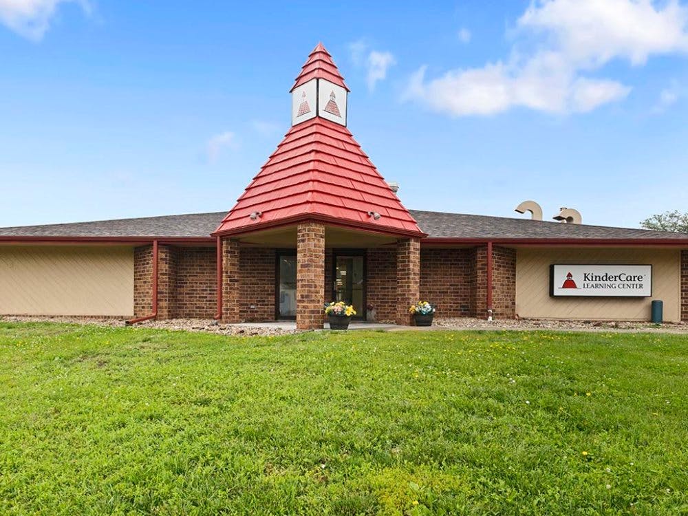 KinderCare Learning Center building with red roof
