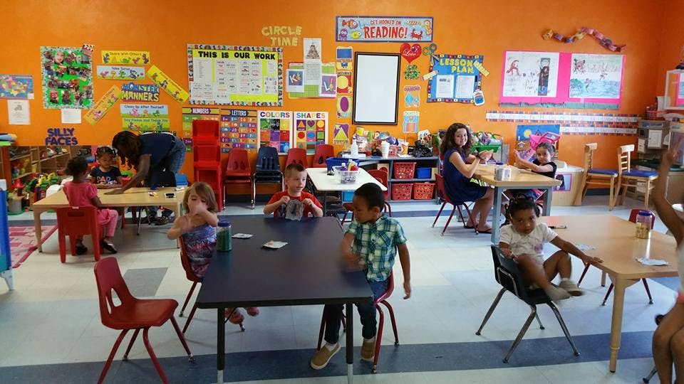 Children and adults in a classroom