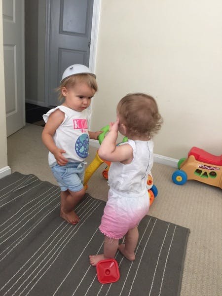 Two children playing with toys