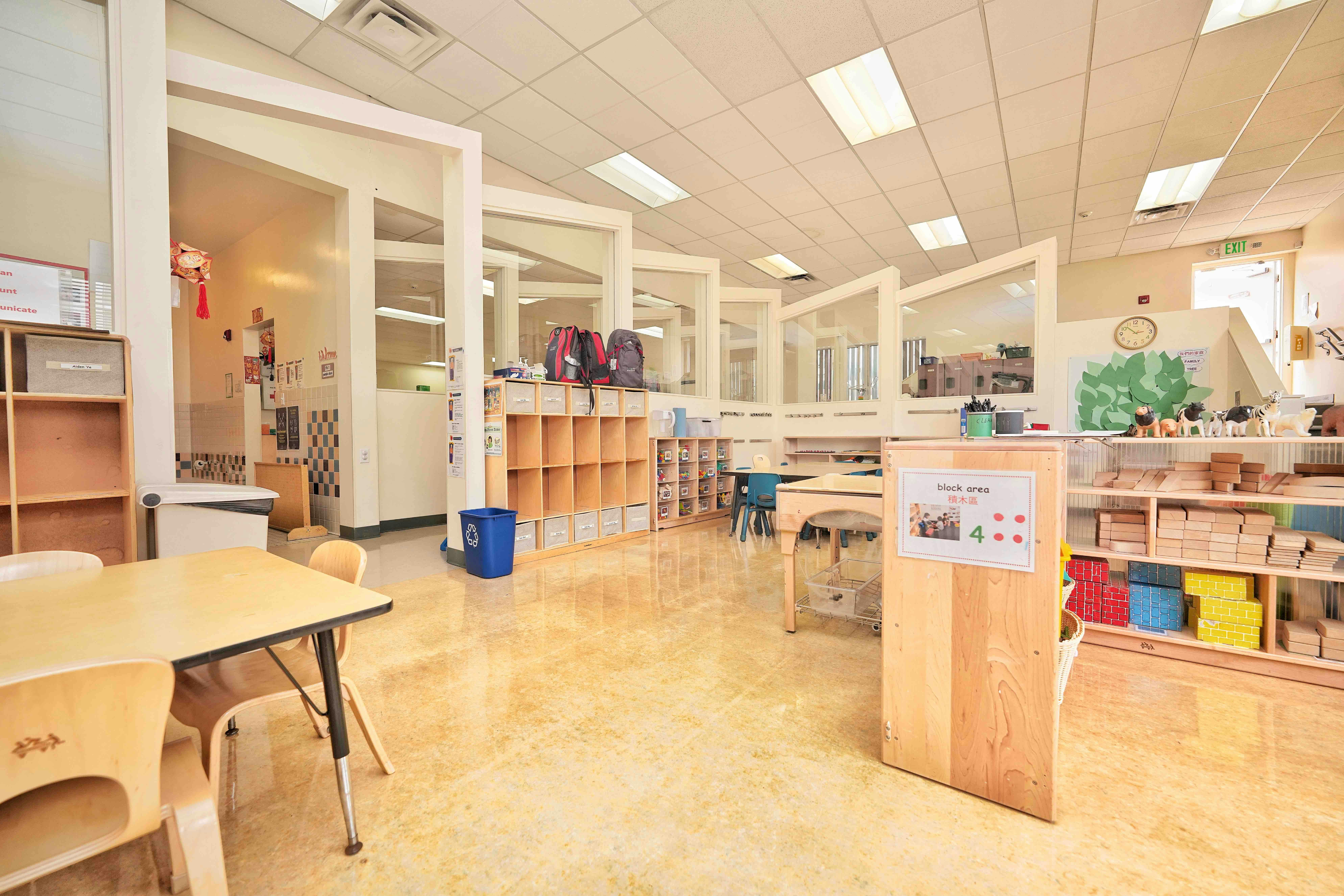 Classroom interior with cubbies and a designated block area