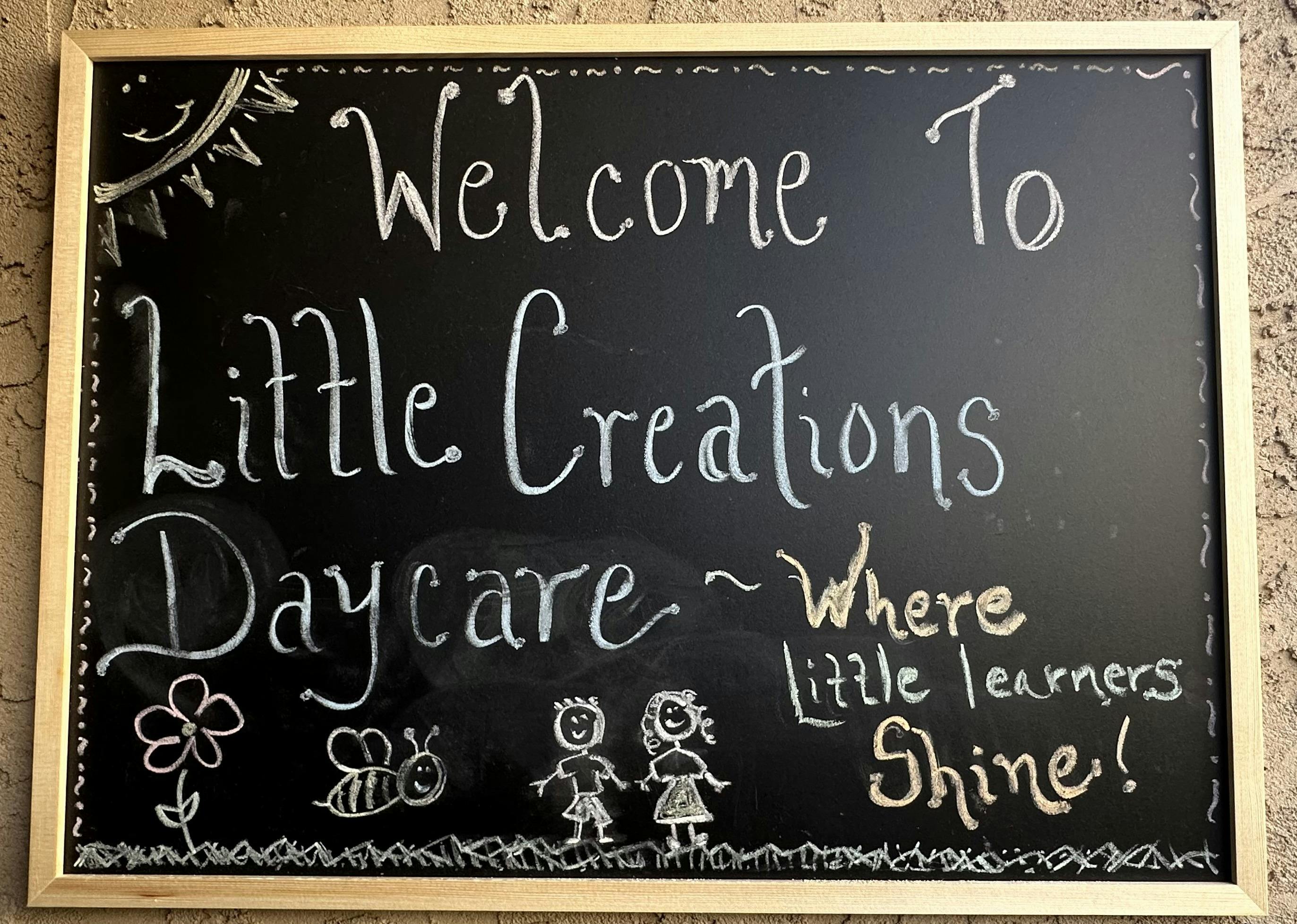 Chalkboard with \"Welcome to Little Creations Daycare, where little learners shine!\"