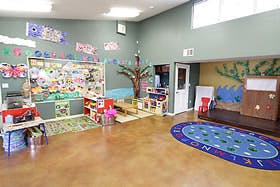 Classroom with colorful decorations and play areas