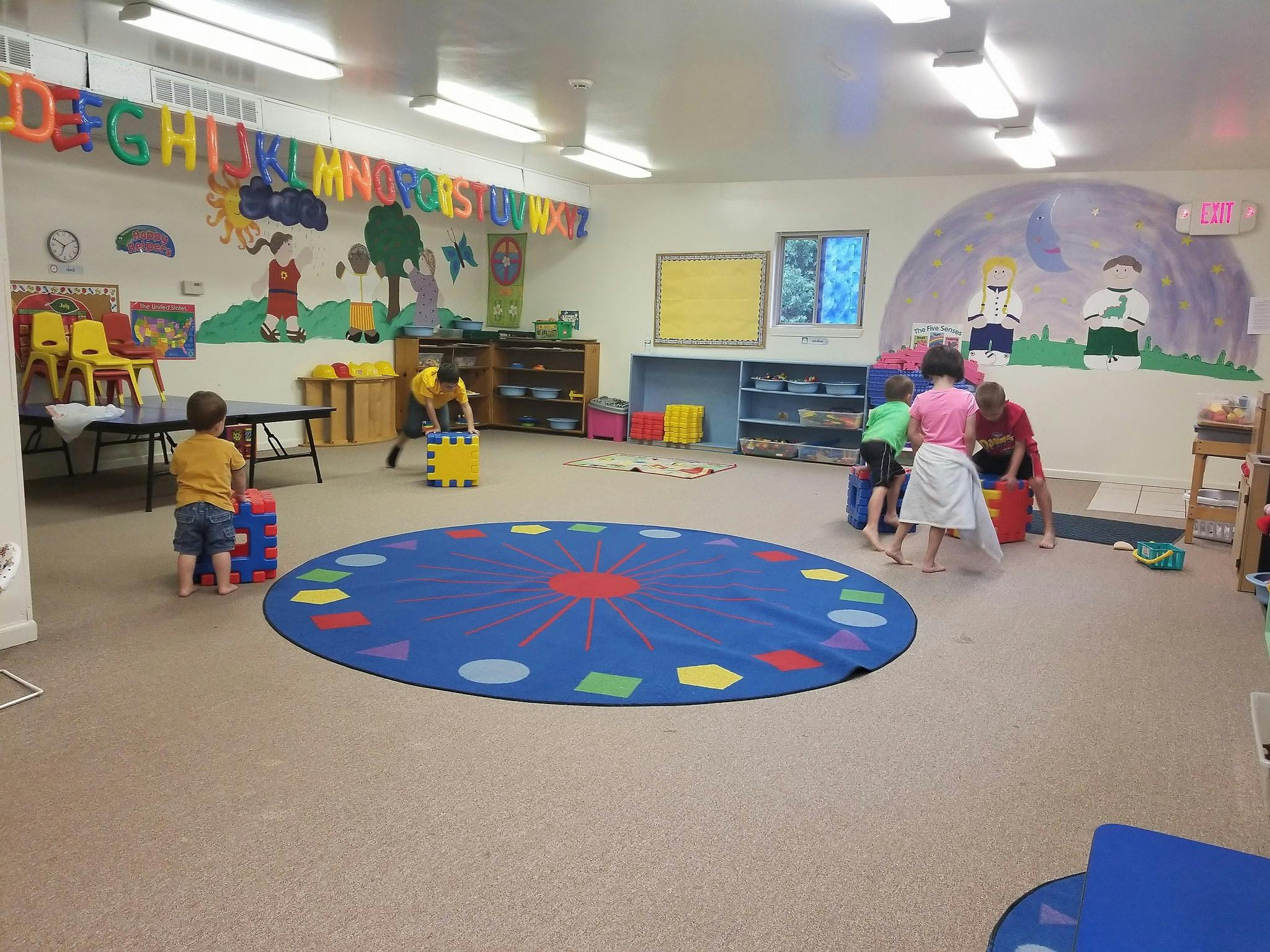 Children playing in a classroom
