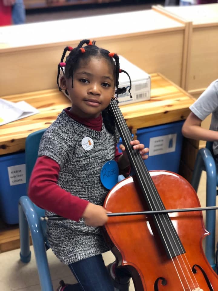 Child playing a cello
