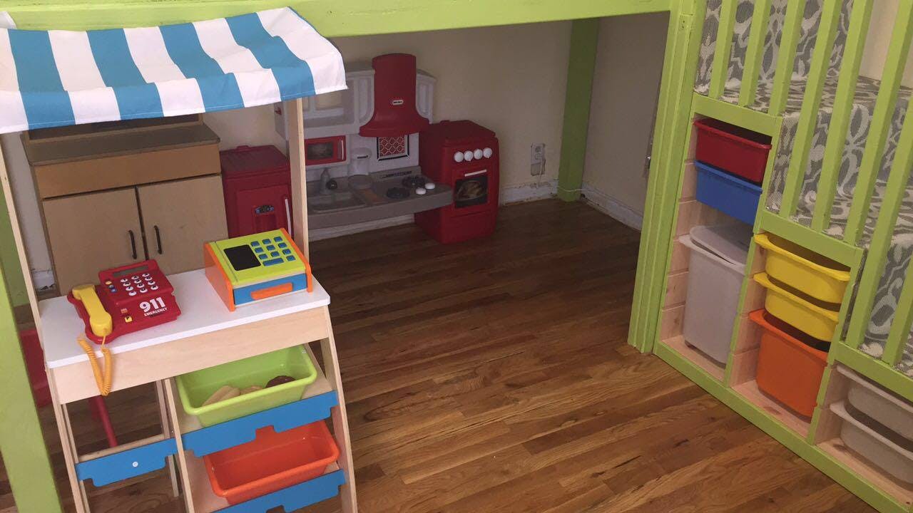 Play kitchen and market stand with toy phone and cash register