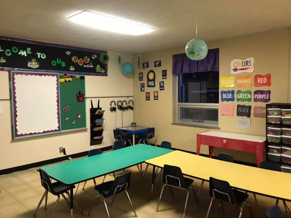 Classroom with colorful tables and chairs