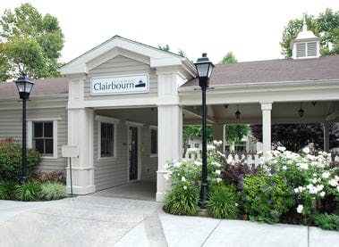 Building entrance with a sign that reads "Clairbourn"