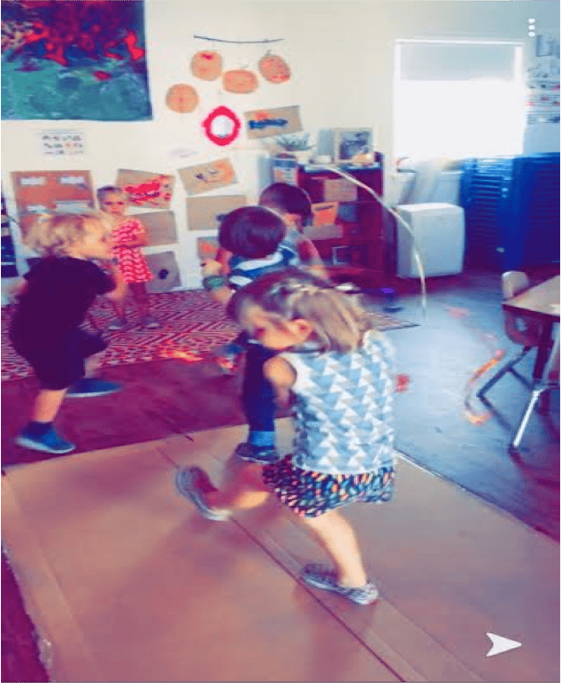 Children playing in a classroom