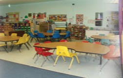 Classroom with small tables and chairs