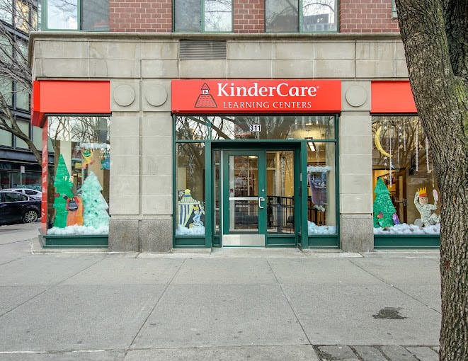 KinderCare Learning Centers storefront with holiday decorations in windows