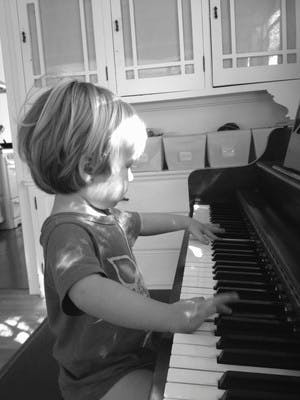 Child playing piano