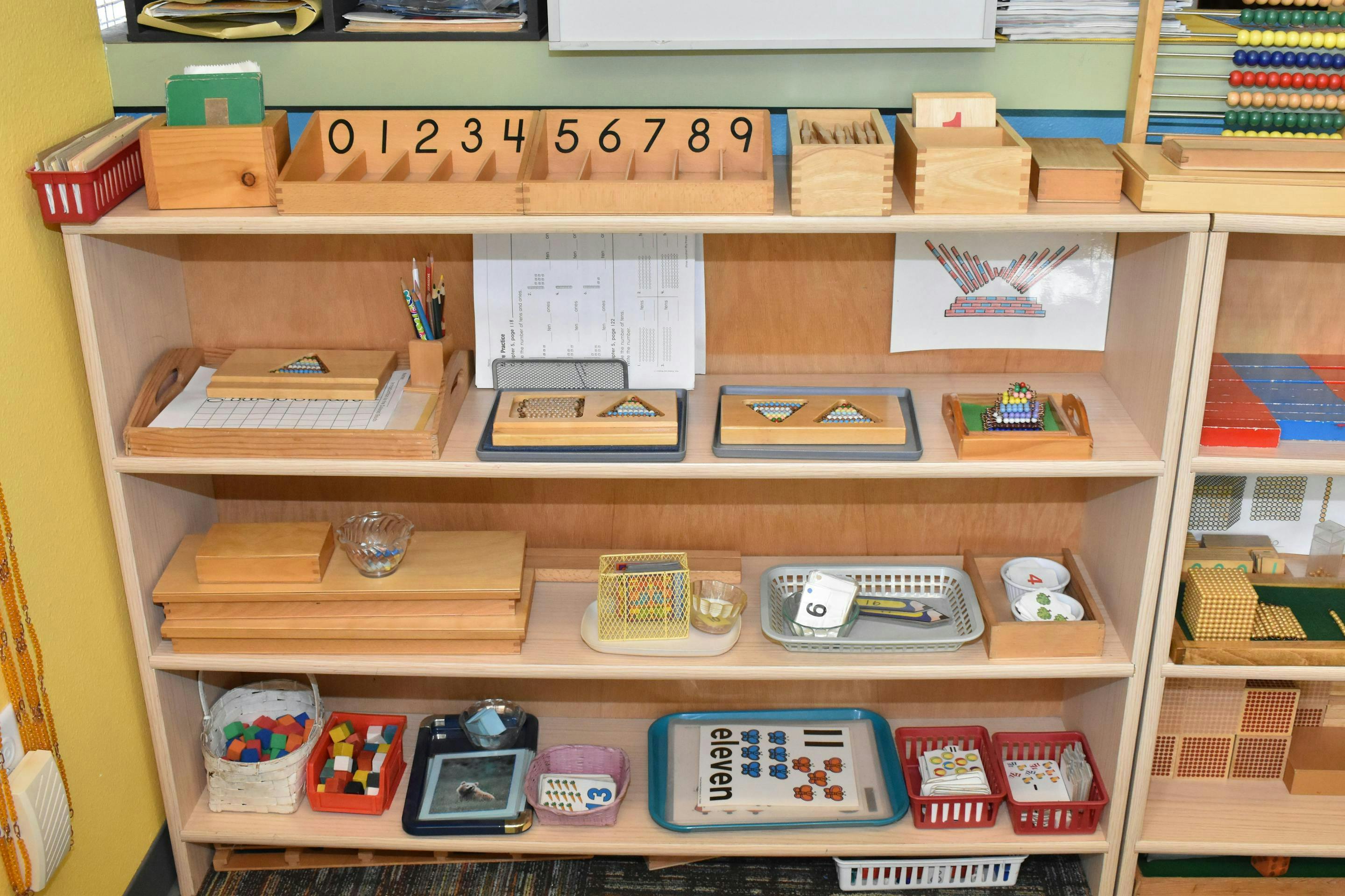 Shelves with various educational materials and toys