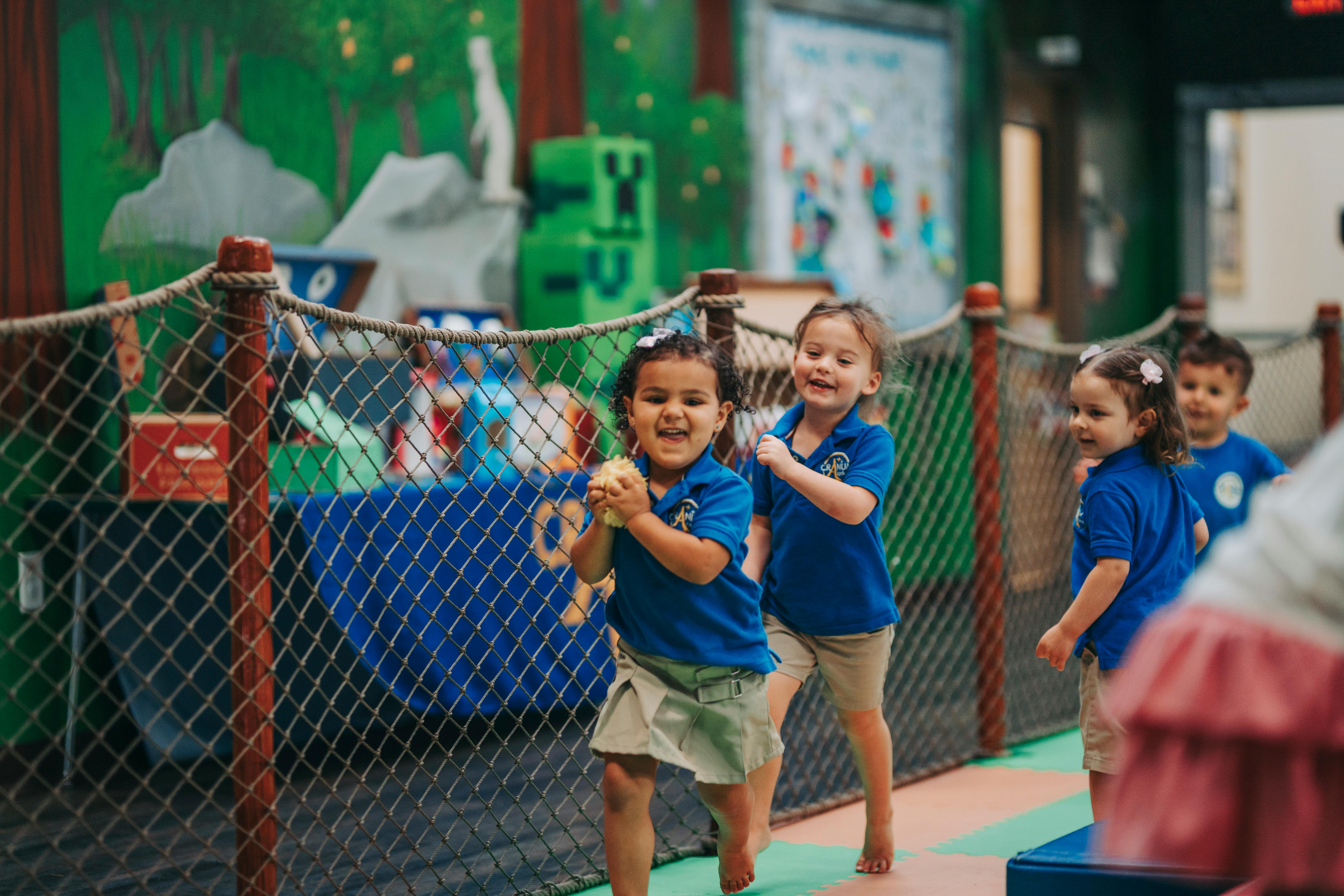 Children running and playing indoors