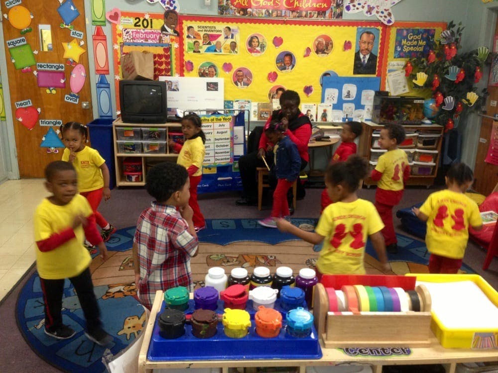 Children and adults in a classroom