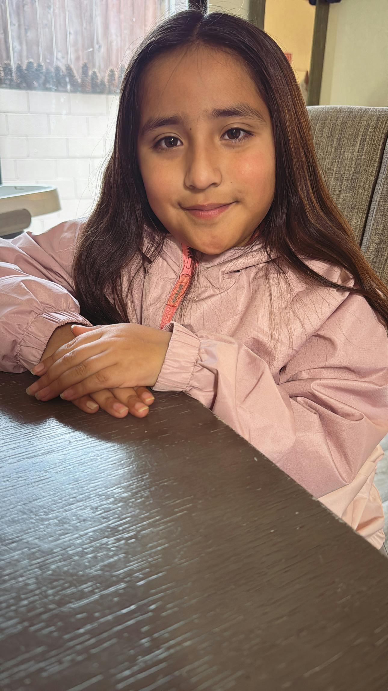 A child sitting at a table