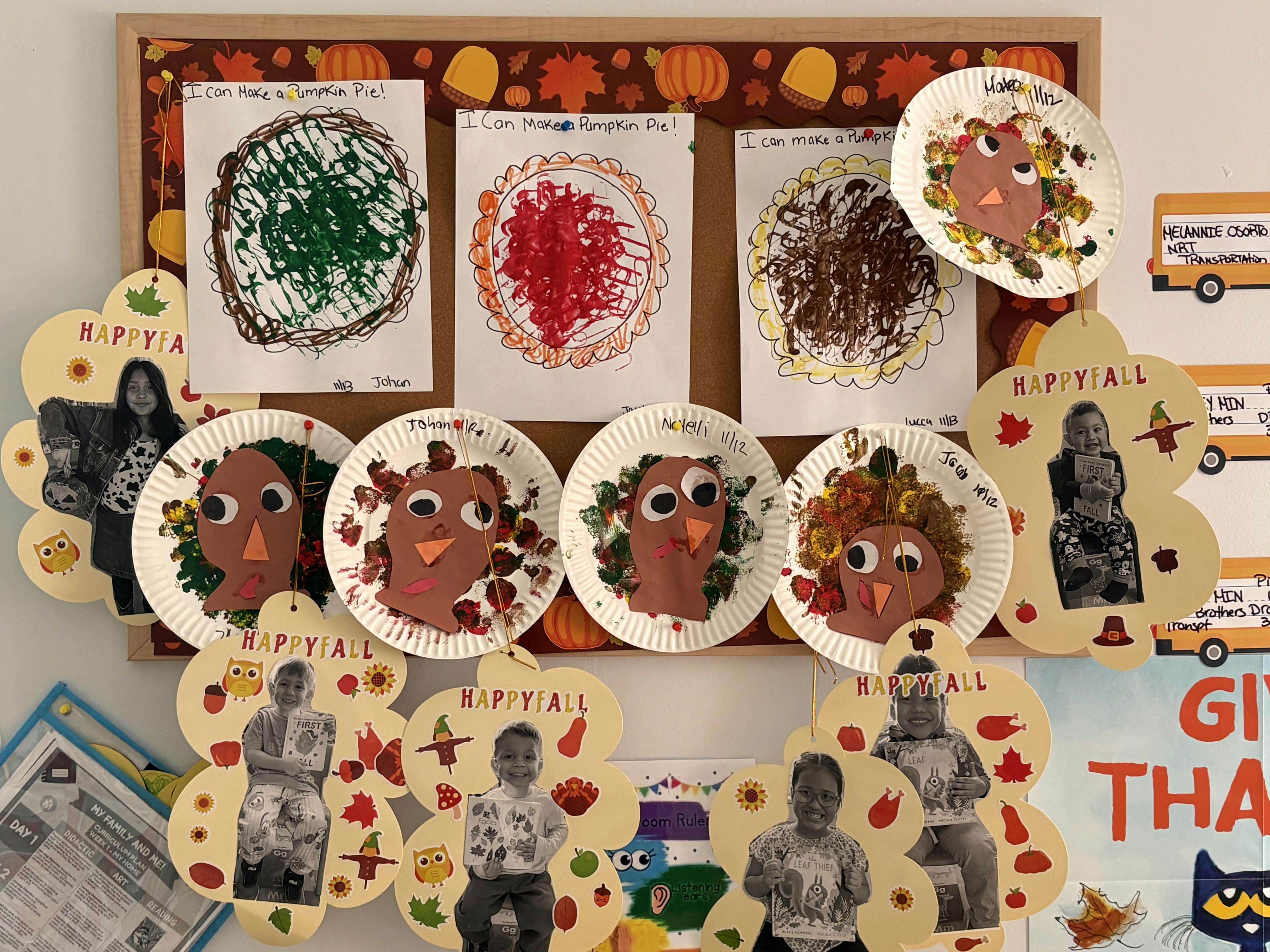 Children's artwork displayed on a bulletin board