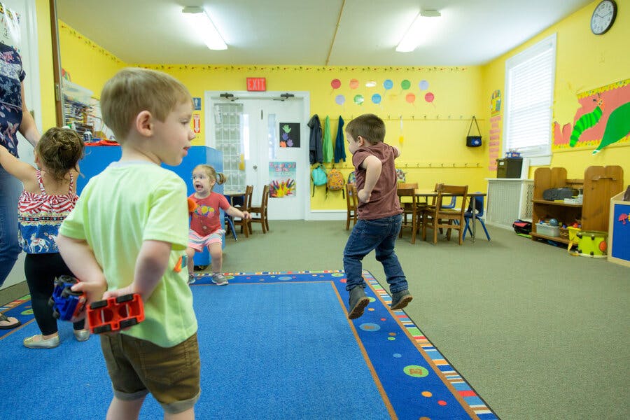 Children playing in a classroom