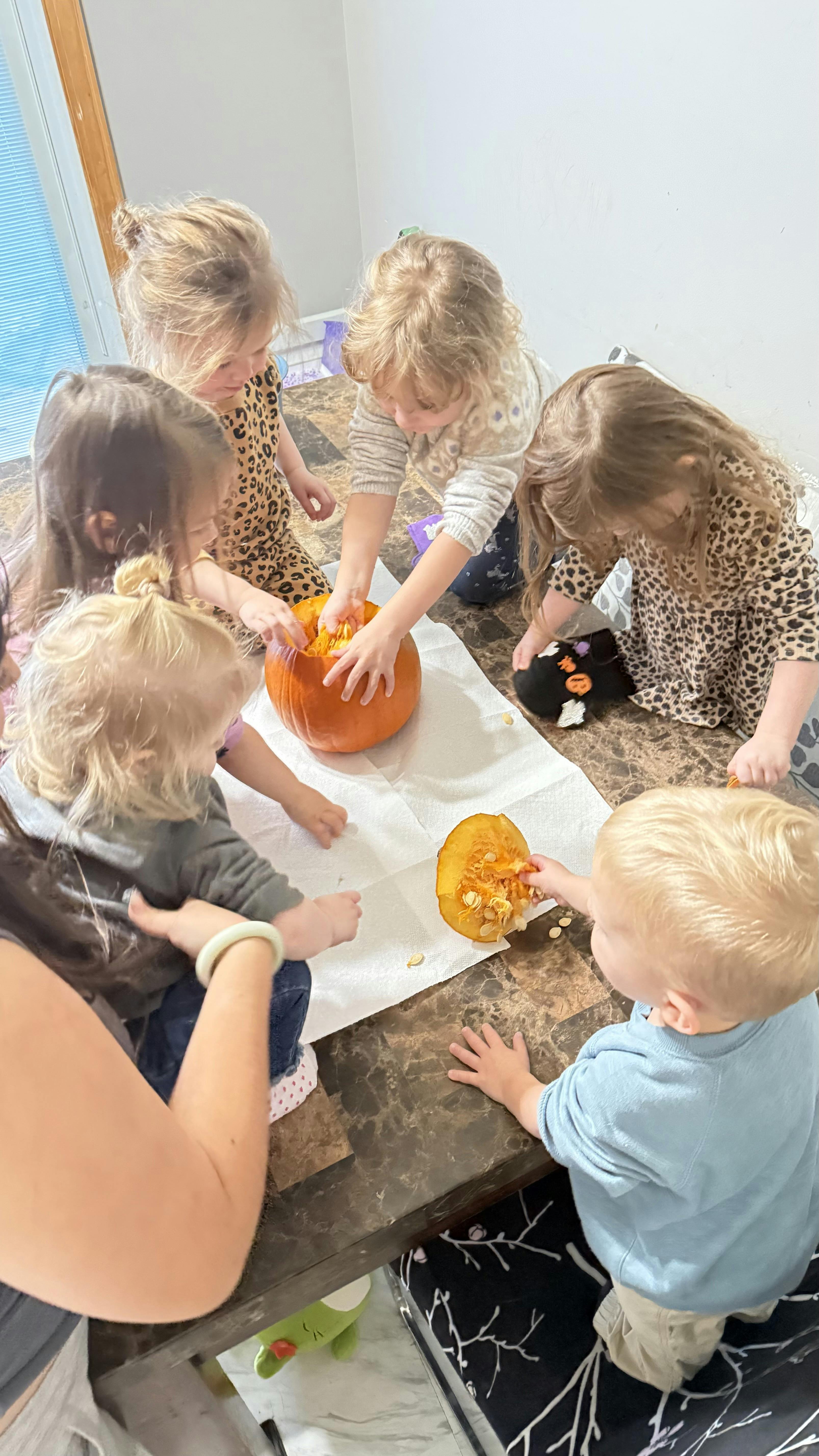 Children carving pumpkins
