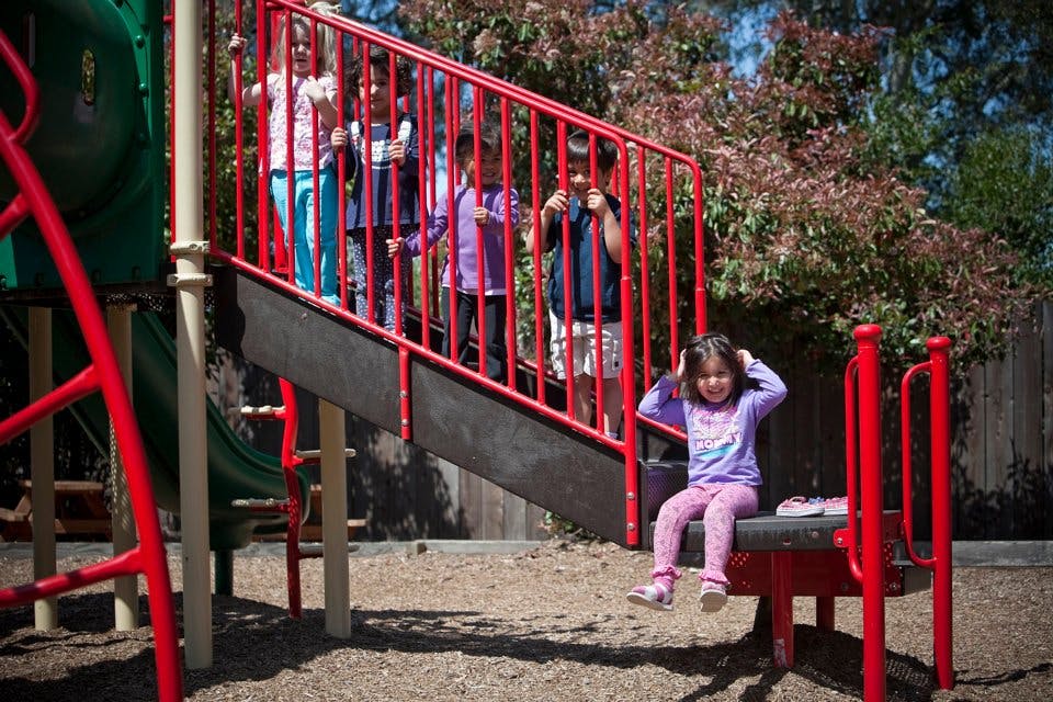 Children on a playground structure