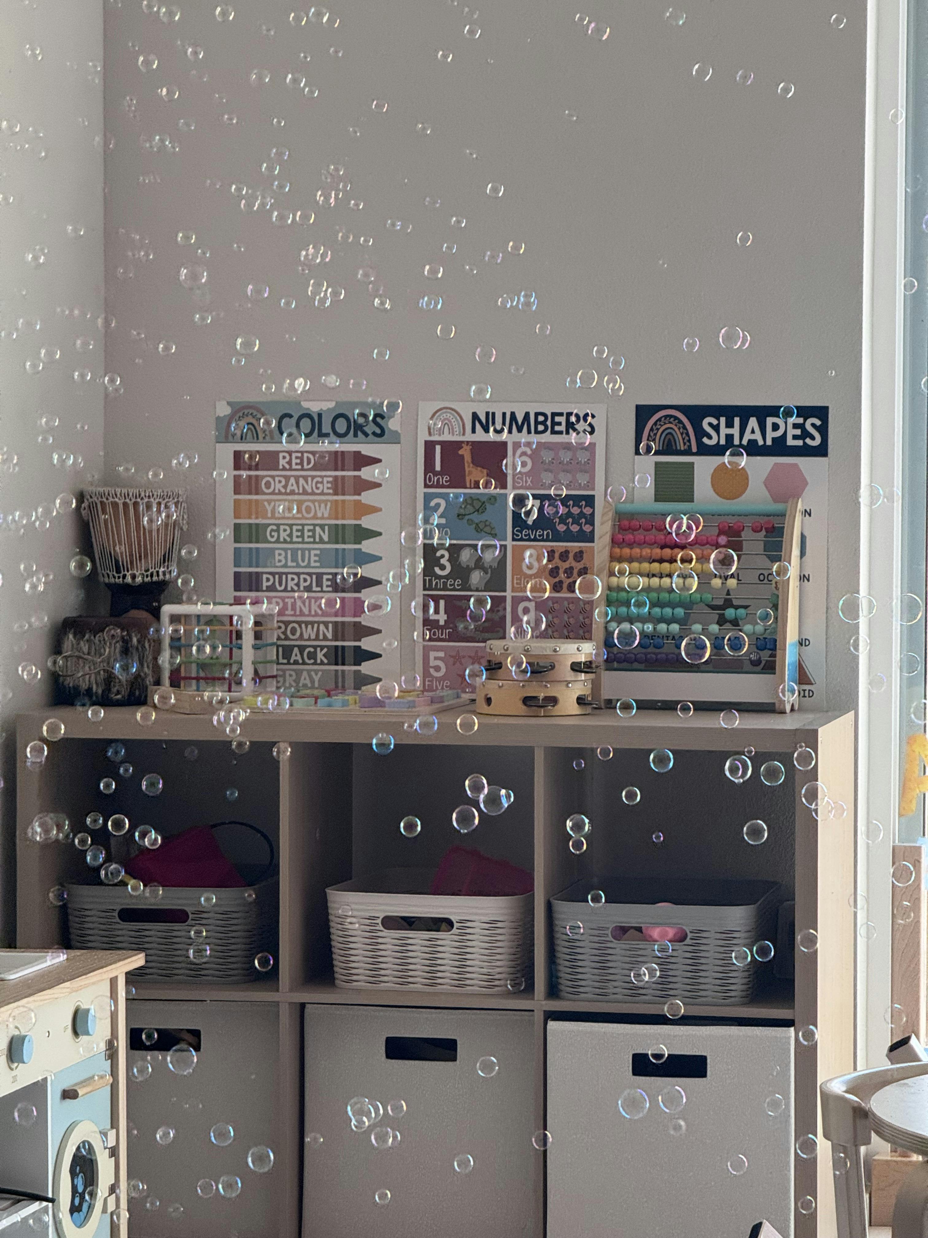 Bubbles floating in front of classroom shelves with educational posters