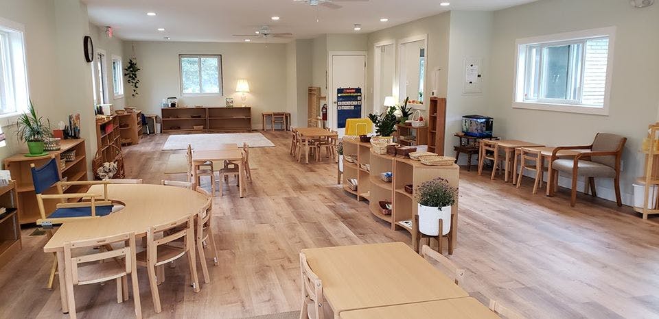 Classroom with small tables and chairs