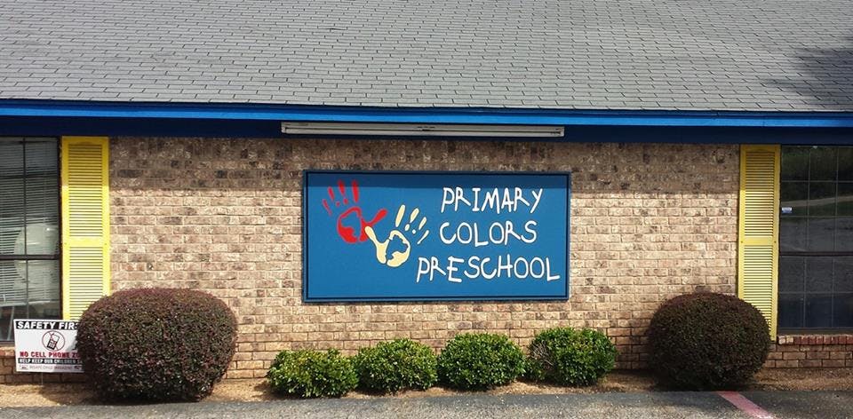 Sign for Primary Colors Preschool with handprints