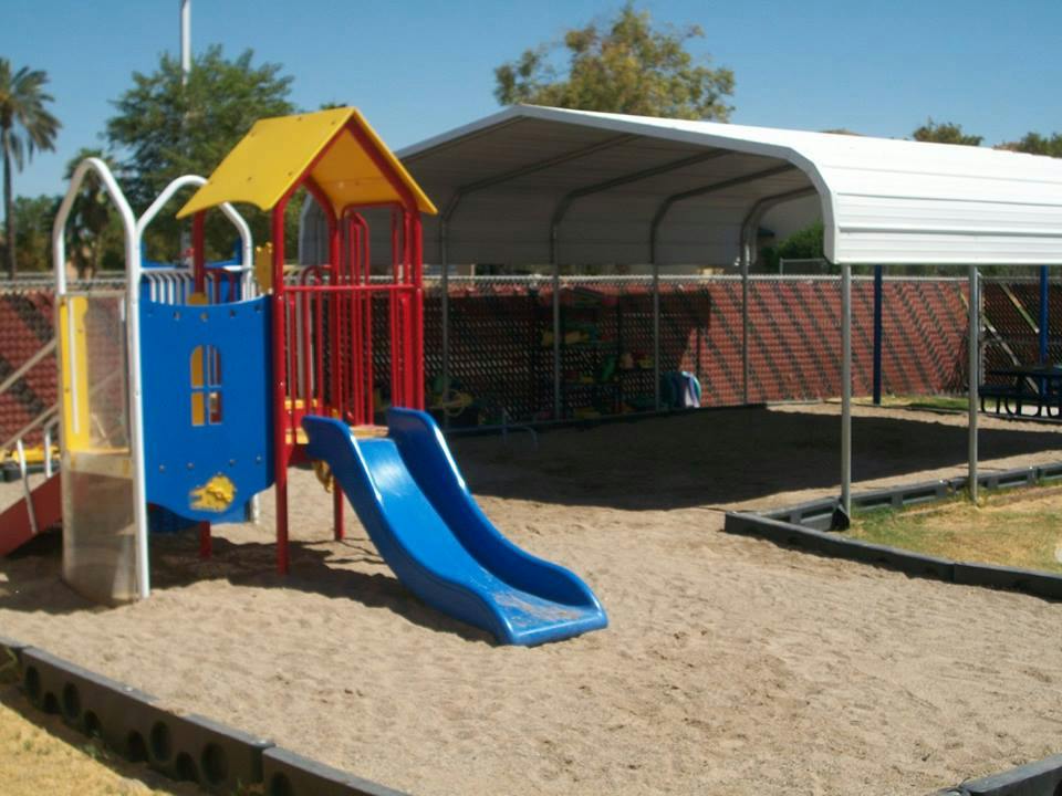 Playground with slides and a covered area