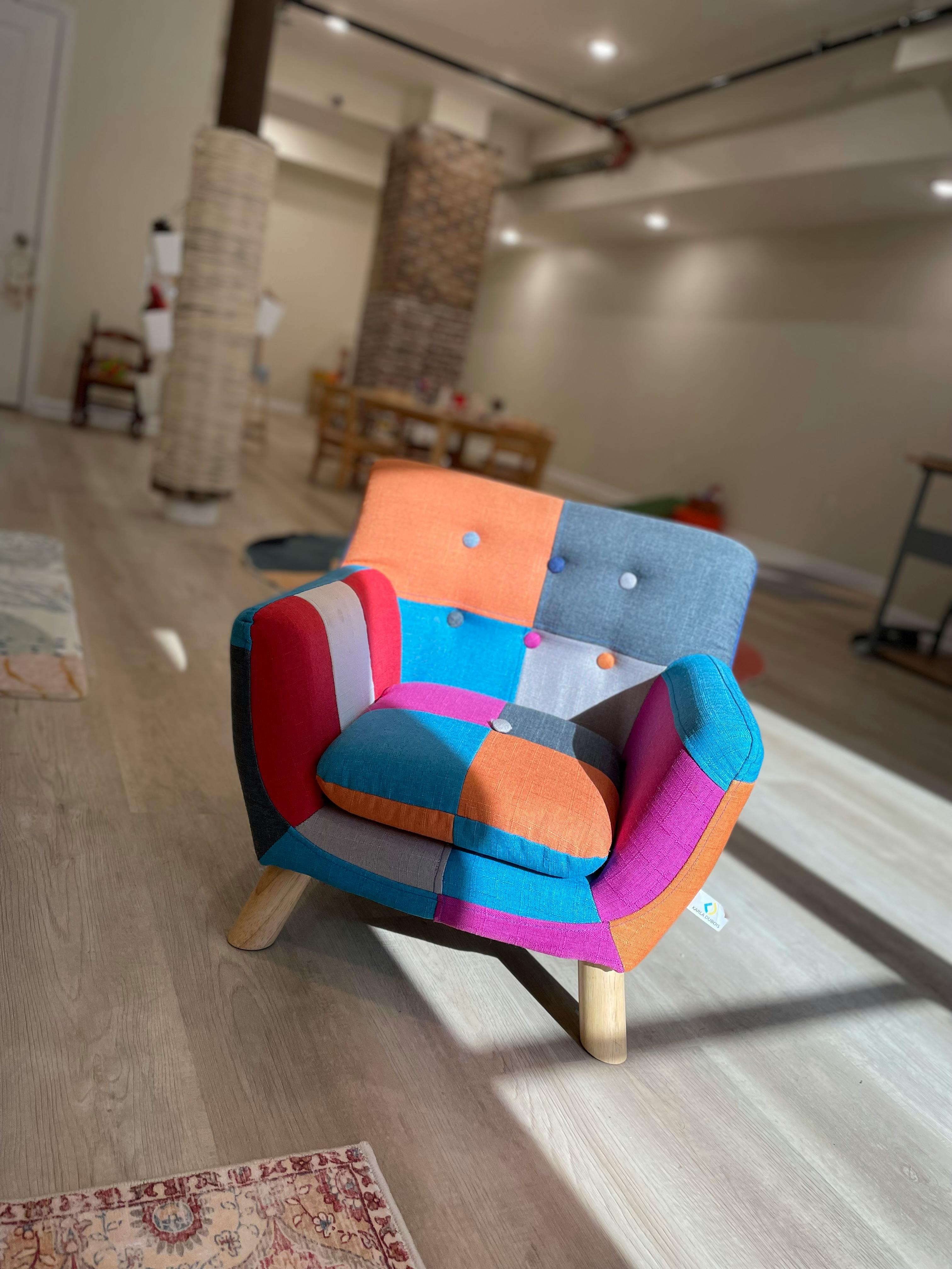 Patchwork armchair with various colored fabric squares