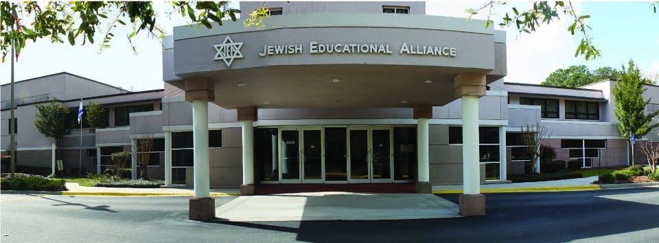 Building with "Jewish Educational Alliance" sign above entrance