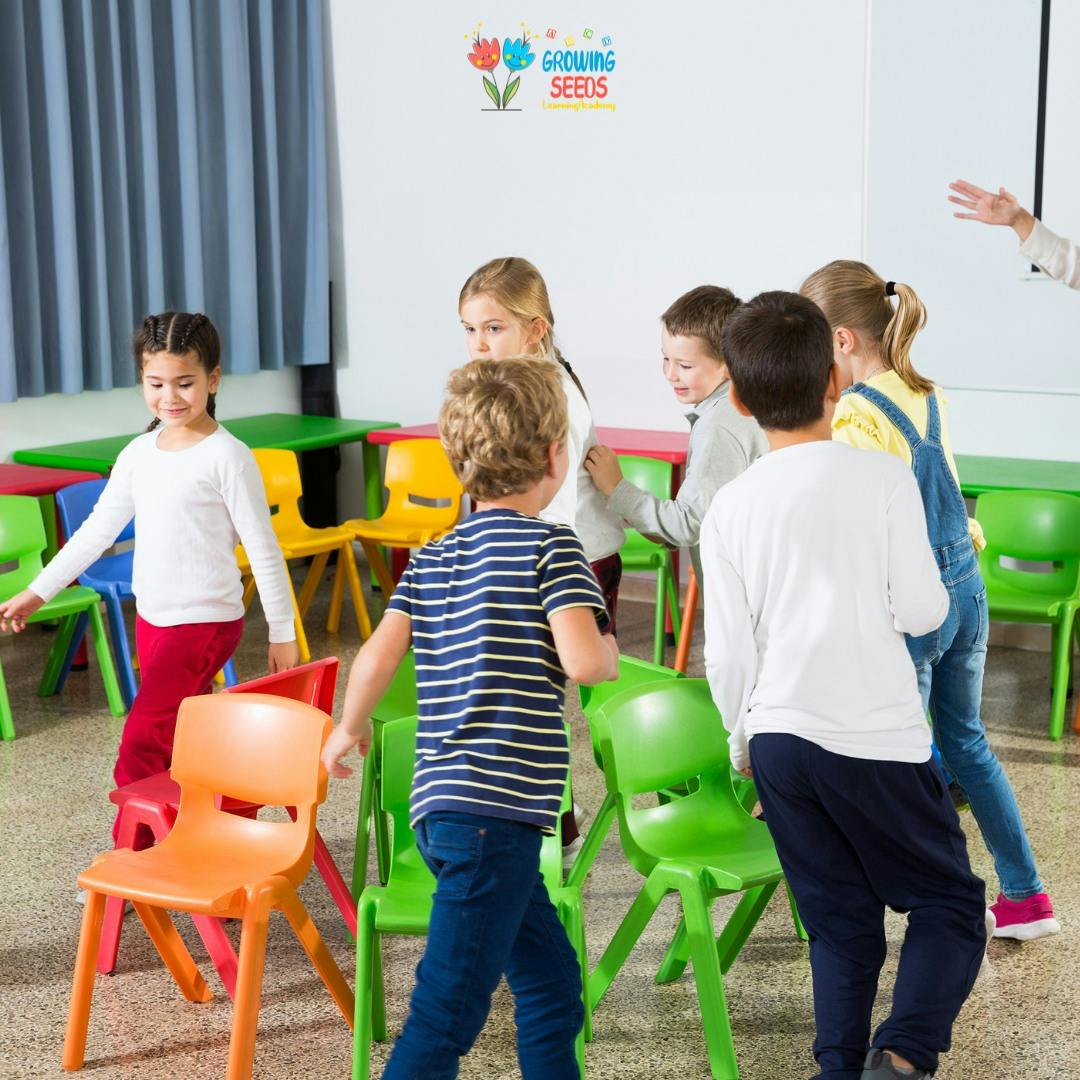 Children playing musical chairs in a classroom
