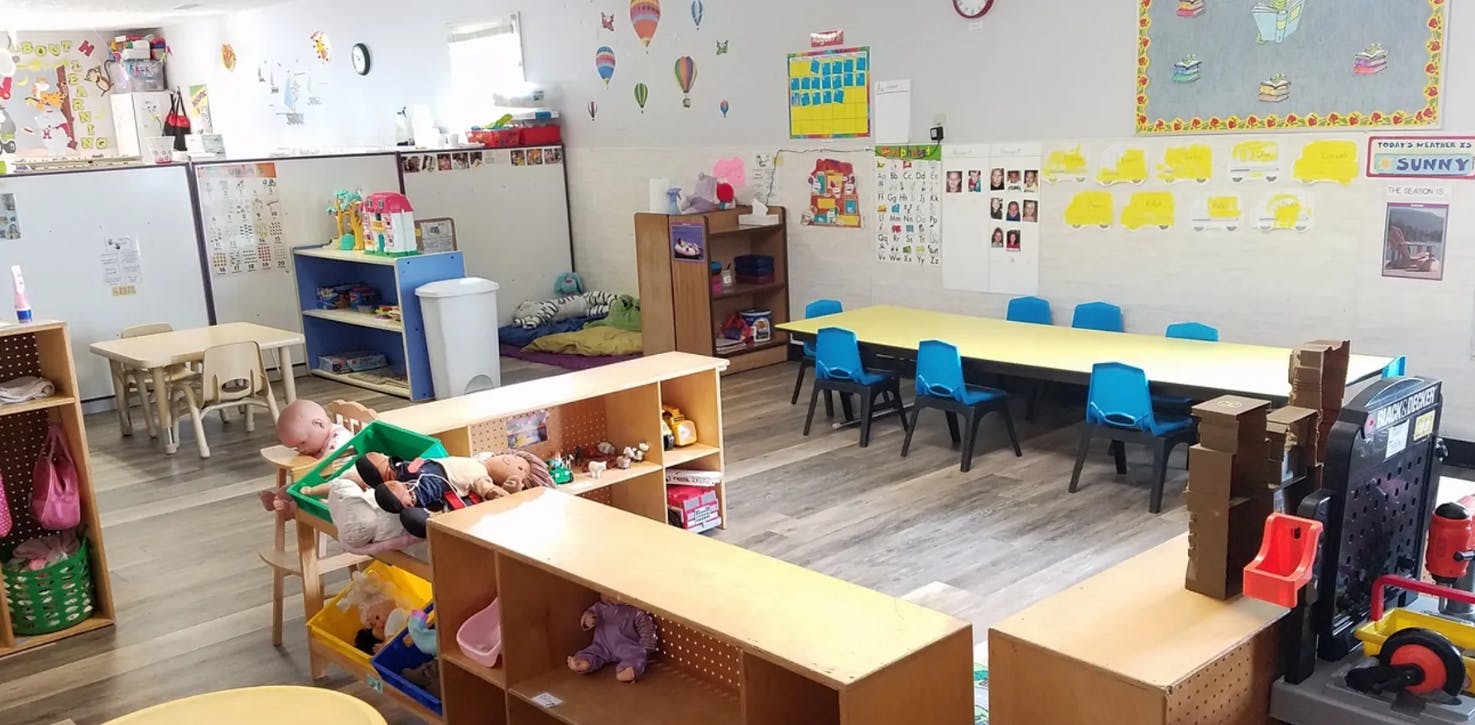 Classroom with small tables and chairs