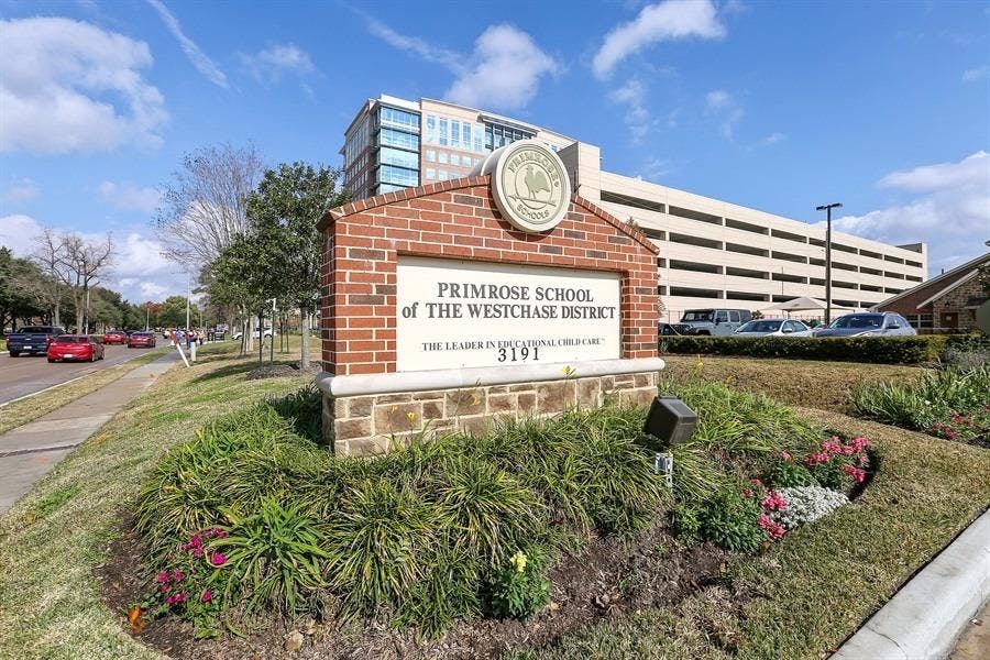 Brick sign for Primrose School of The Westchase District
