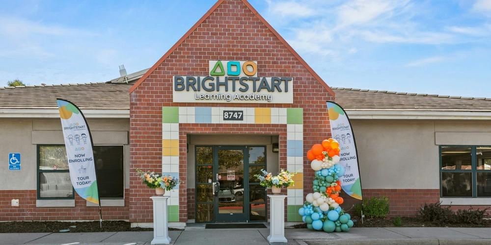 Exterior entrance of Brightstart Learning Academy with balloon display