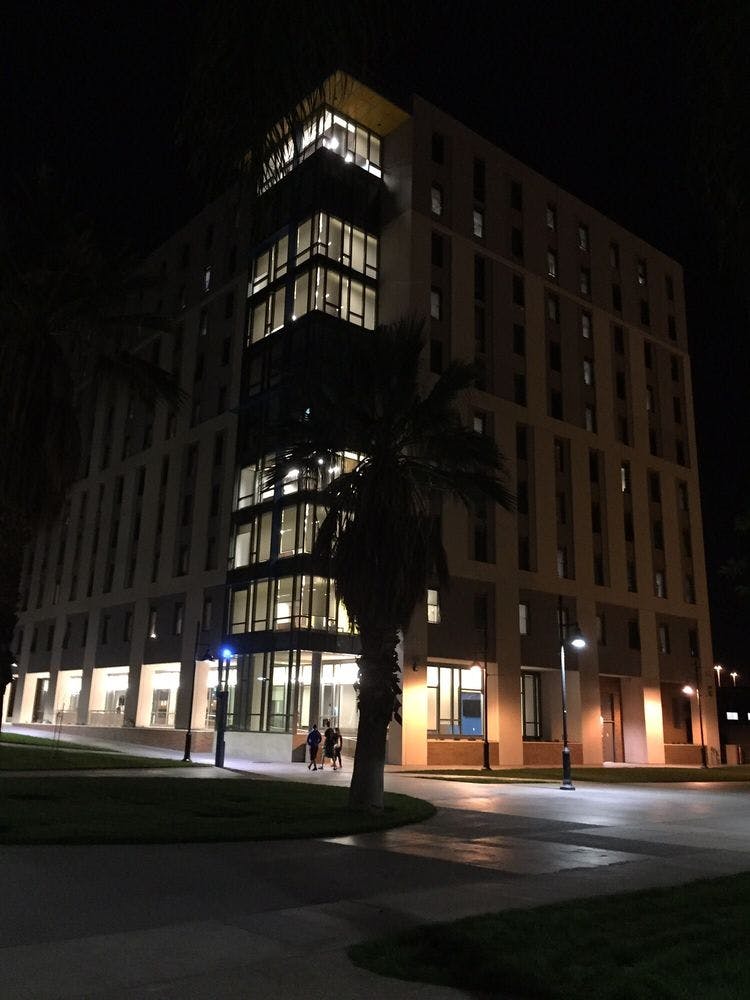 Tall building with illuminated windows at night