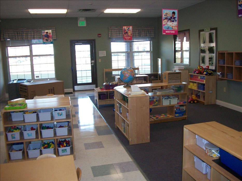 Classroom with shelves of toys and learning materials