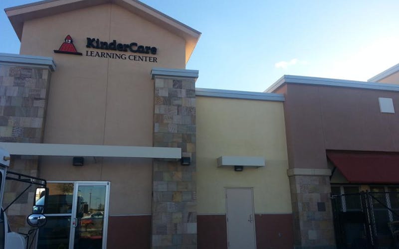 Exterior view of a KinderCare Learning Center building with its sign