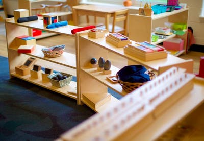 Shelves with various educational materials in a classroom