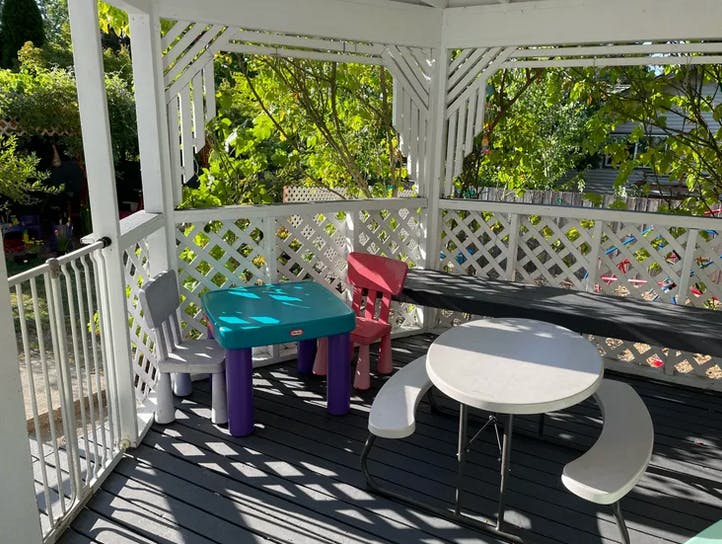 Outdoor gazebo with children's tables and chairs