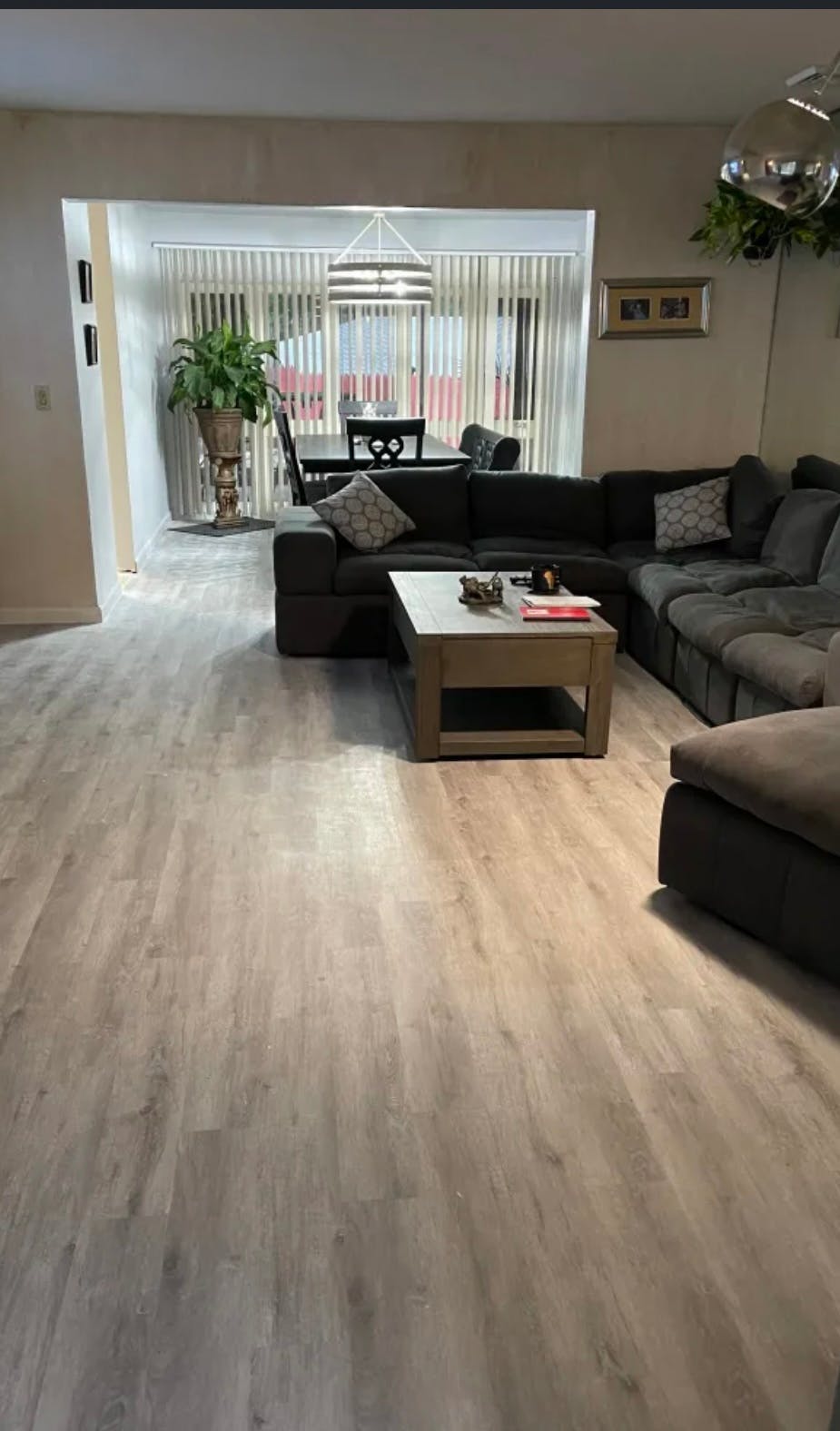 Living room with a large sectional sofa and coffee table