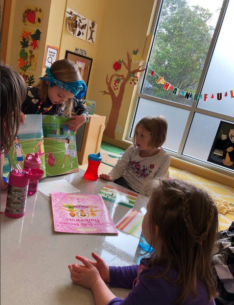 Children at a table in a classroom