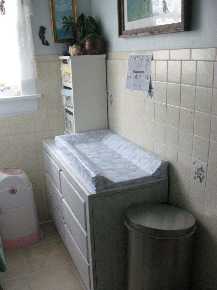 Changing table with a changing pad on top