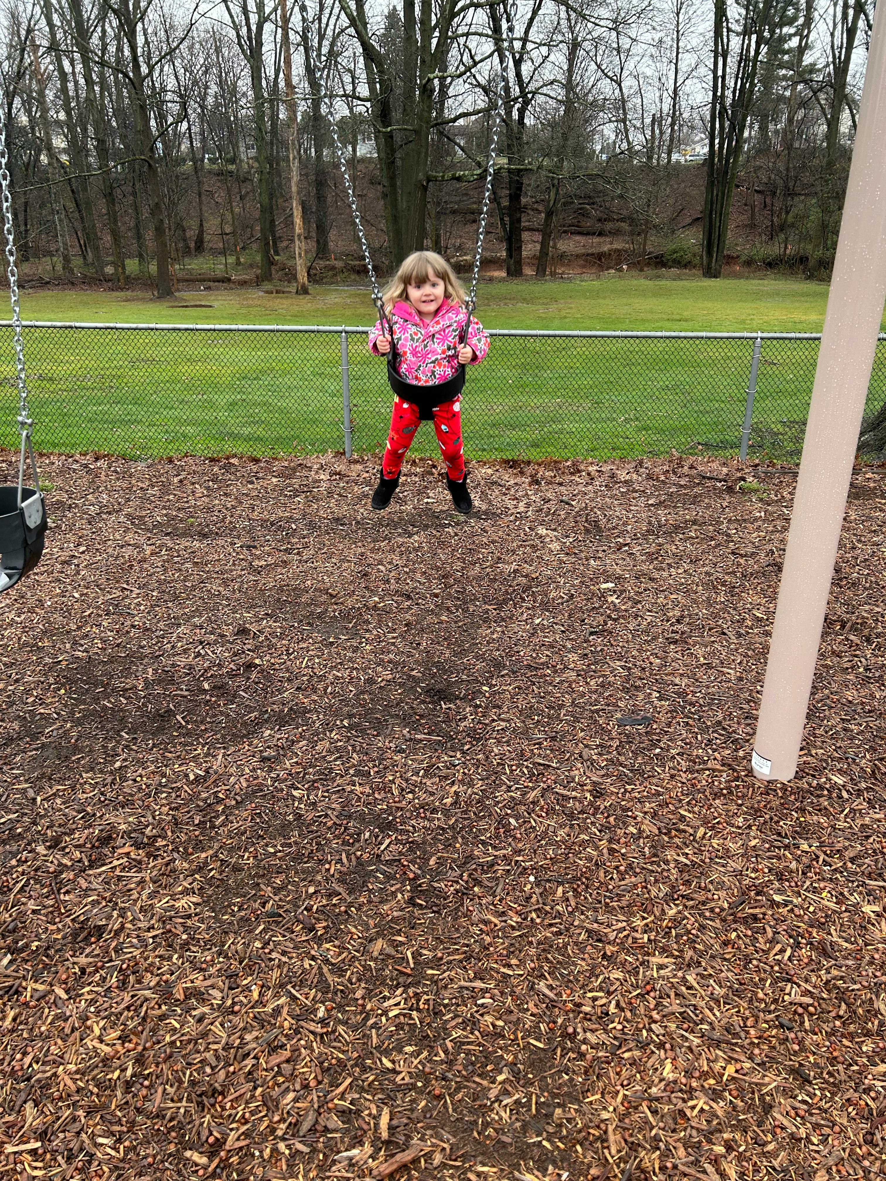 Child on a swing set