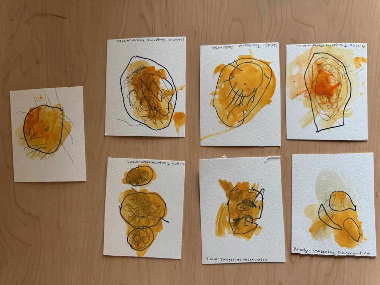 Seven small abstract paintings with yellow and orange paint and black lines