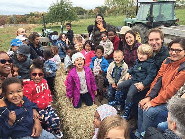 Group of adults and children on a hayride