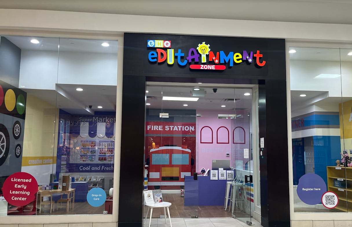 Storefront with "Edutainment Zone" sign above the entrance