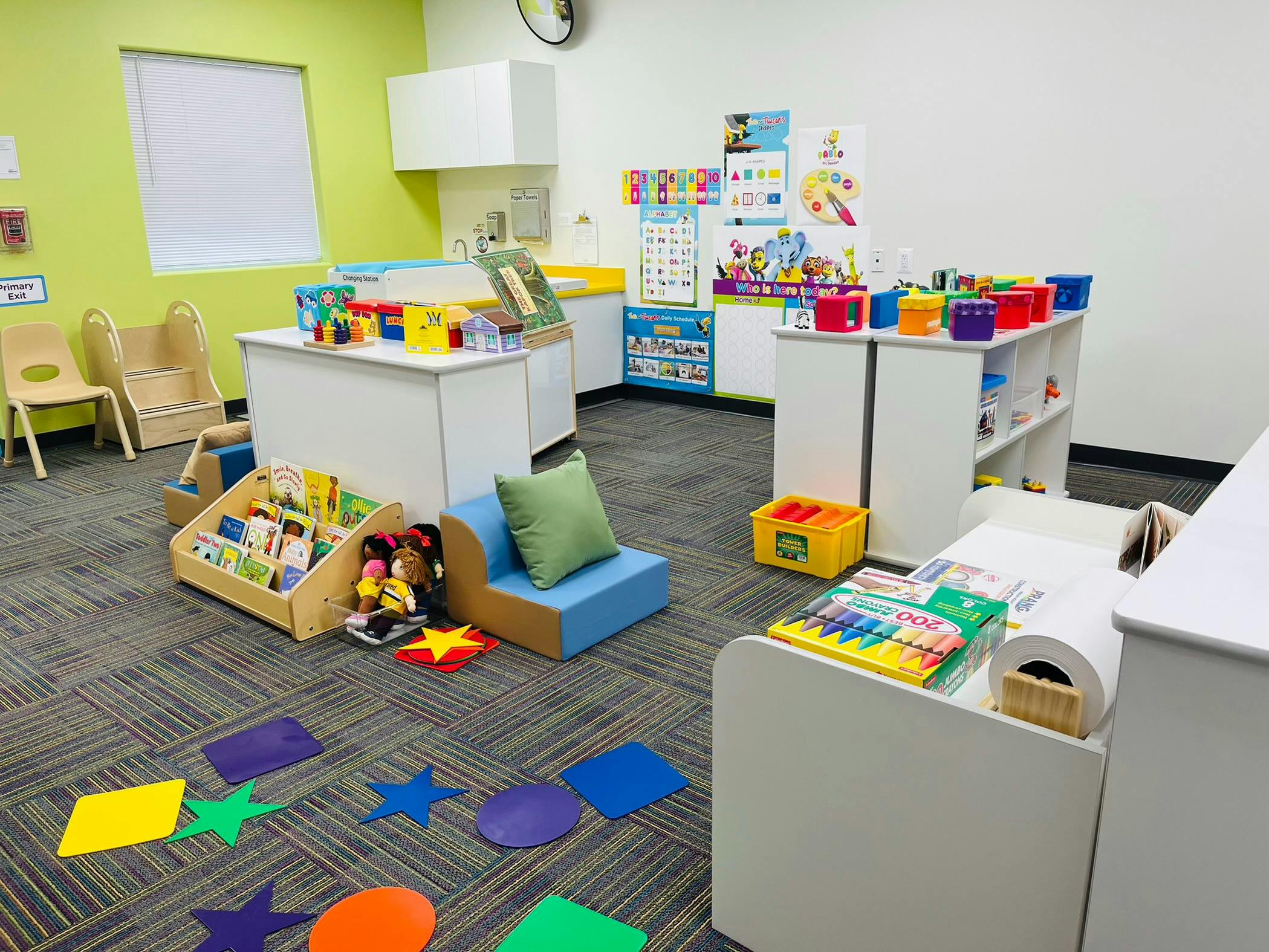 Classroom with colorful learning materials and furniture