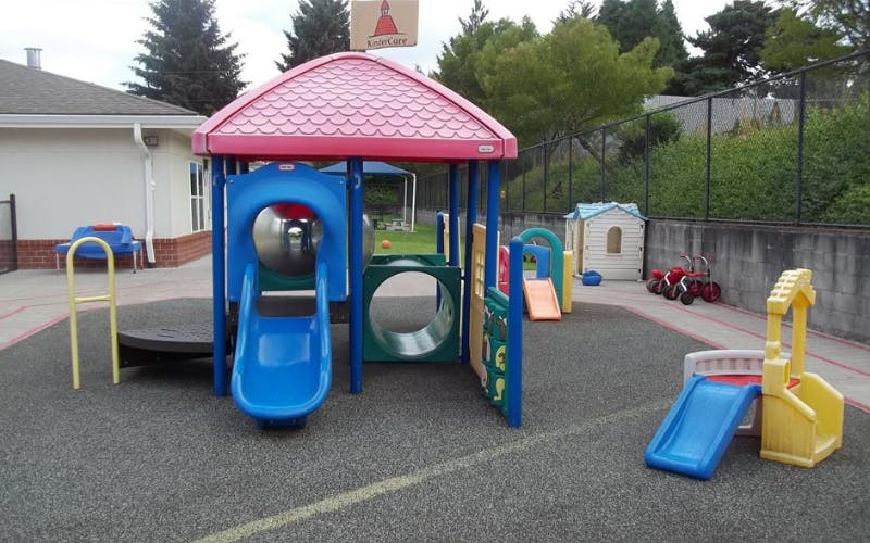 A children's playground with colorful climbing structures and slides