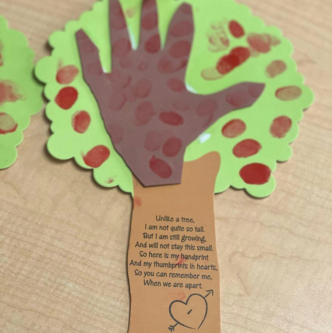 Craft tree with a handprint and poem on the trunk