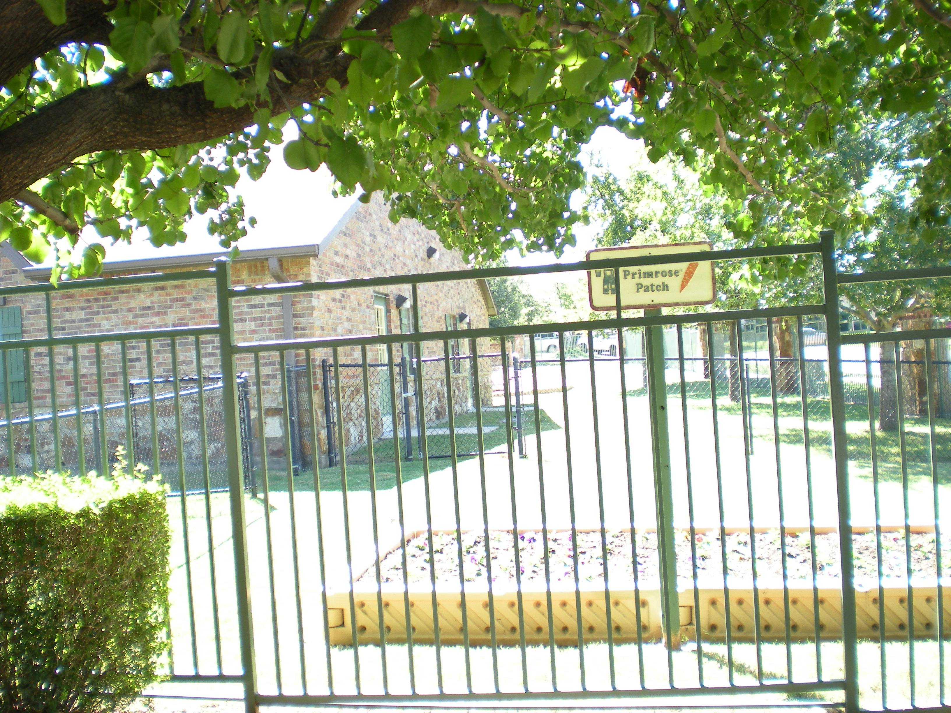 Metal fence with a sign that reads "Pioneer Park"